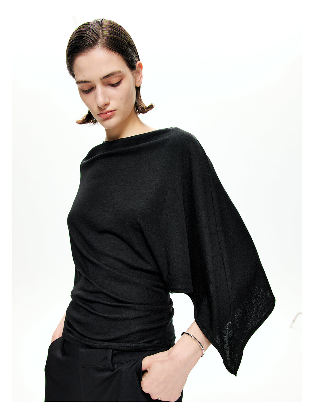 Sculptural Asymmetric Knit Top