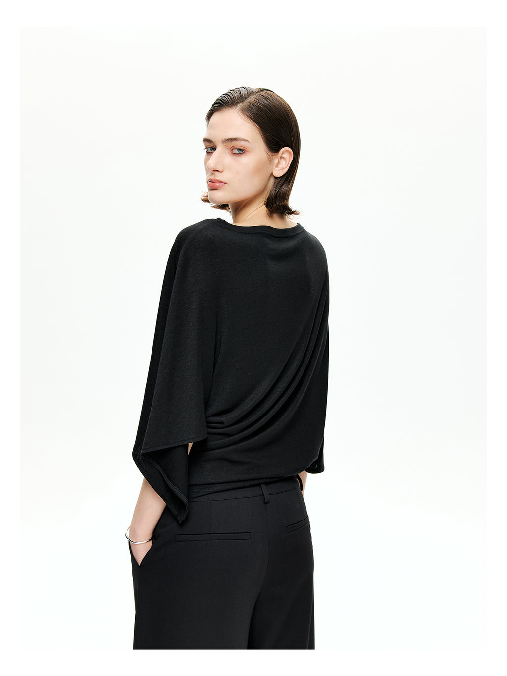 Sculptural Asymmetric Knit Top